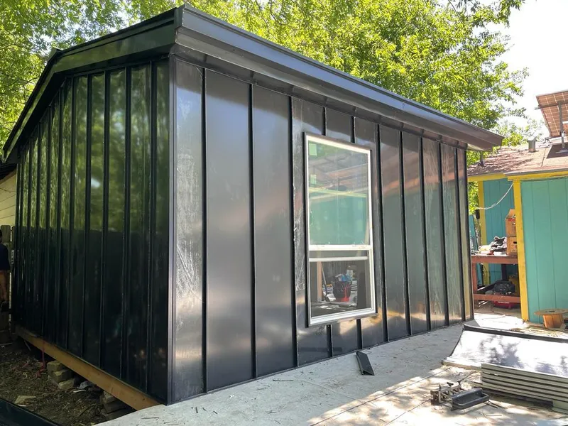 Black standing seam metal wall panels for Metal Roof Installation in Paragould